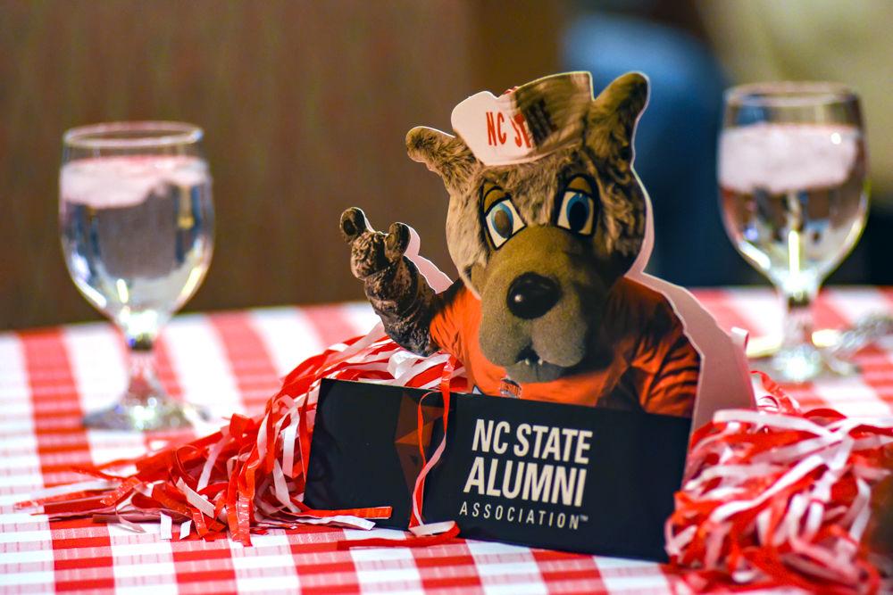 A Mr. Wuf mini standee sits on one of the dining tables at the Legacy Admissions Information Day dinner on Monday, March 4, 2019 in Talley Student Union.