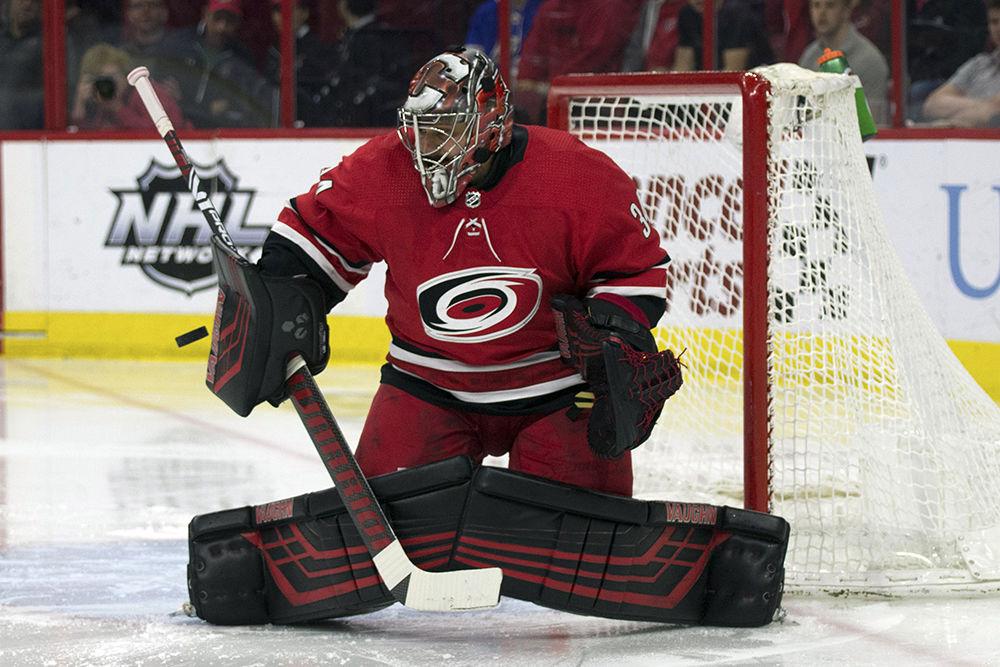 Goaltender Petr Mrazek blocks a shot on goal from the Philadelphia Flyers while in PNC Arena, Saturday, March 30. Mrazek had one assist on an empty net late in the third period, and blocked 30 of 32 shots on goal. The Canes took flight, winning 5-2 at home.&#160;
