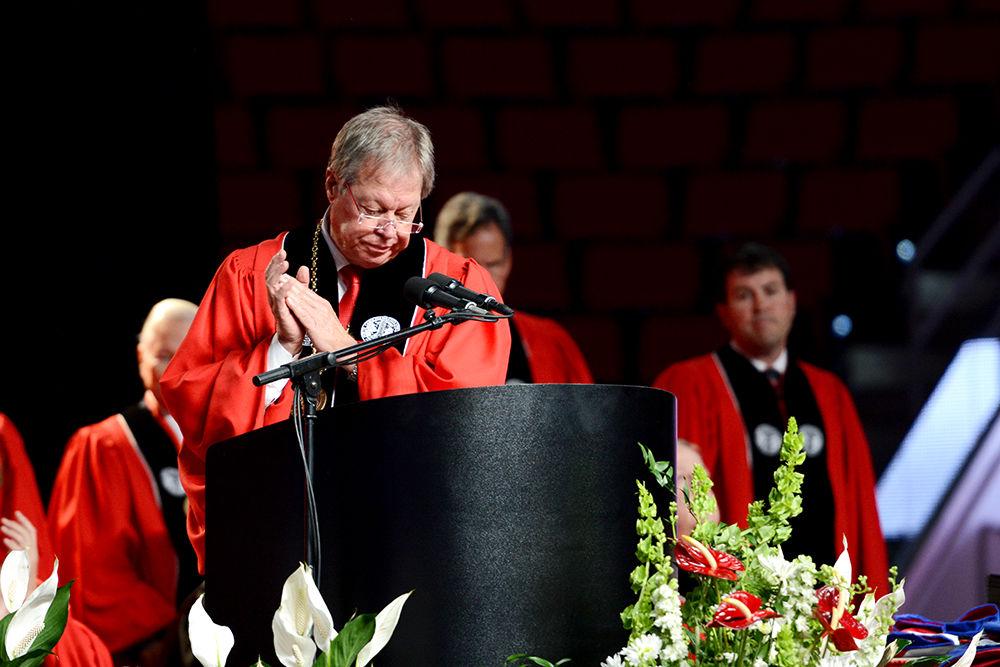 A dean congratulates the recent graduates during the Commencement Ceremony on Saturday, May 11, 2019 in PNC Arena.