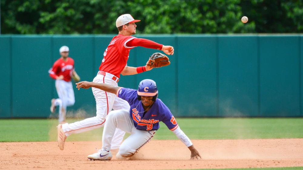Junior infielder Will Wilson gets the force out at second base but can&#8217;t get the ball to first base in time for the double play on Saturday, May 11, 2019 at Doak Field. Wilson went 0-2 with one run batted in, one walk and one strikeout in the Wolfpack&#8217;s 4-3 extra inning loss.