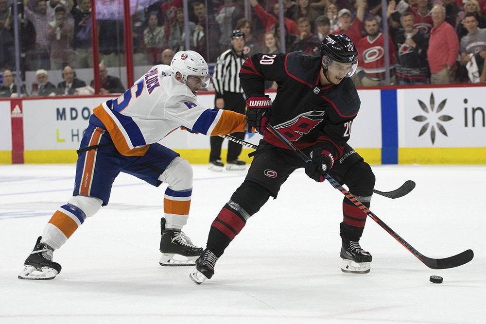 Right winger Sebastian Aho maintains control of the puck to score the last goal of the game with 0:05 left on the clock, Wednesday, May 1. The Canes beat the New York Islanders with home ice advantage, 5-2, and lead the series with a 3-0 advantage.