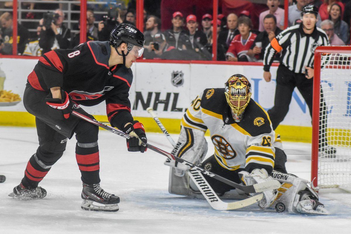 Boston Bruins goalie Tuukka Rask stops a goal attempt by Carolina Hurricanes Saku Maenalanen during game three of the Stanley Cup Eastern Conference Final series on Tuesday, May 14, 2019 in PNC Arena. The Hurricanes lost to the Bruins 2-1.