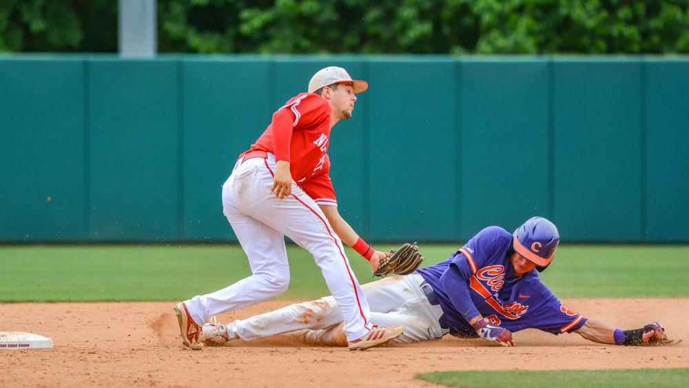 Junior infielder Will Wilson tags out Clemson shortstop Logan Davidson on Saturday, May 11, 2019 at Doak Field. Wilson went 0-2 with one run batted in, one walk and one strikeout in the Wolfpack&#8217;s 4-3 extra inning loss.