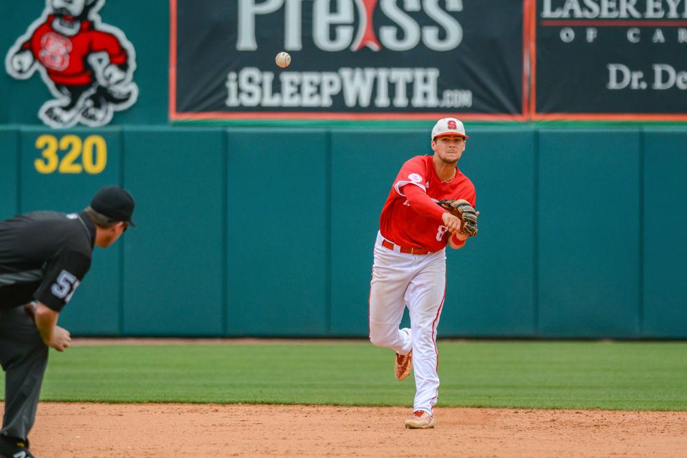 Junior infielder Will Wilson throws to first base against Clemson on Saturday, May 11, 2019 at Doak Field. Wilson went 0-2 with one run batted in, one walk and one strikeout in the Wolfpack&#8217;s 4-3 extra inning loss.