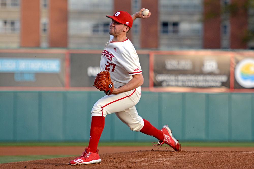 *Editor's note: the original photo has been replaced.Junior pitcher Jason Parker pitches against Virginia on Friday, 29 March at Doak Field. The Wolfpack lost 4-3.