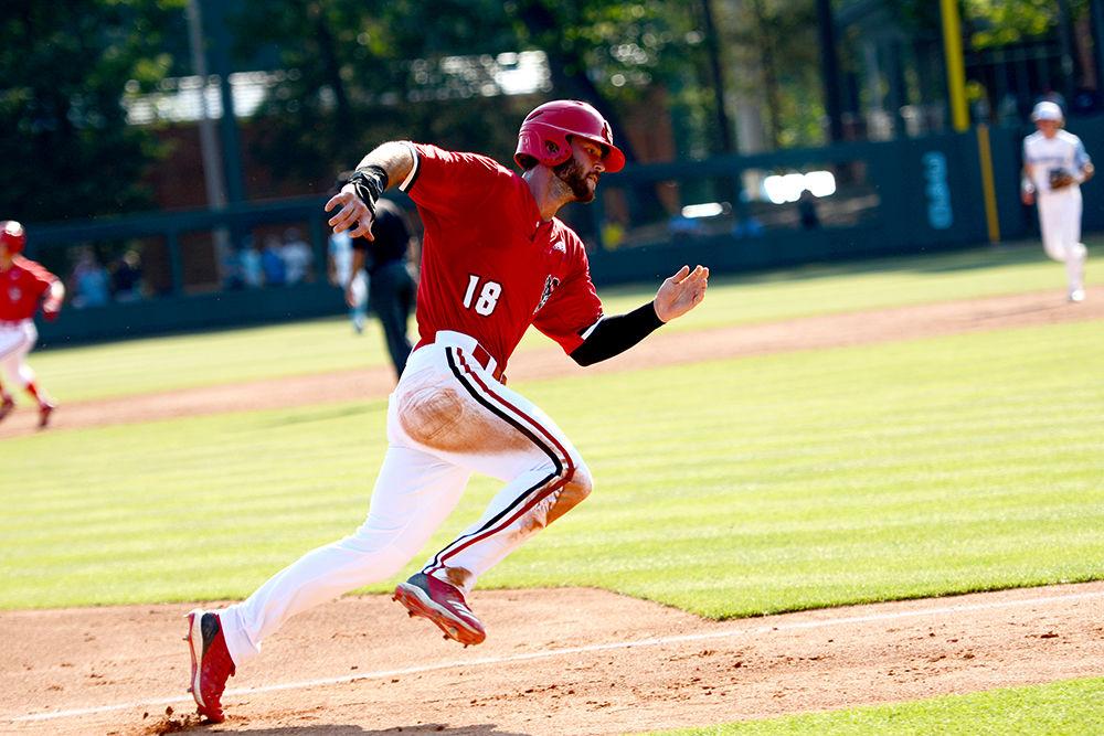 *Editor's Note: the original photo has been replaced.
Senior infielder Evan Edwards sprints during the game against UNC at Bryson Field on Saturday, May 18, 2019. Edwards had two doubles for the Wolfpack in their 11-0 win over the Tar Heels.