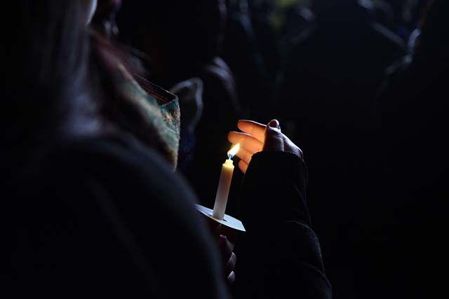 Candles being lit in honor of Deah, Yusor, and Razan at the Our Three Winner Memorial in tribute of the one year anniversary of their passing. The Memorial took place outside of Talley Student Union on Wednesday, Feb. 10 2016.