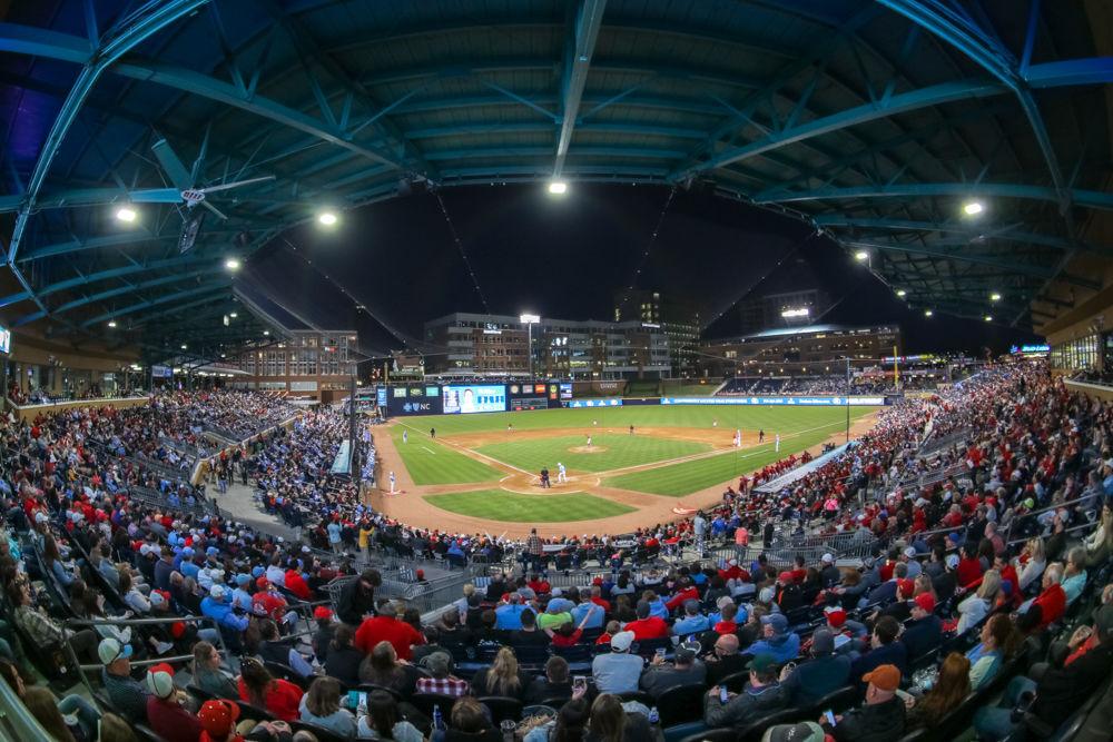 Nearly 6800 fans pack the infield of Durham Bulls Athletic Park to watch the Duel at the DBAP between NC State and UNC. NC State never trailed on the way to a 8-3 win on Tuesday, April 17.