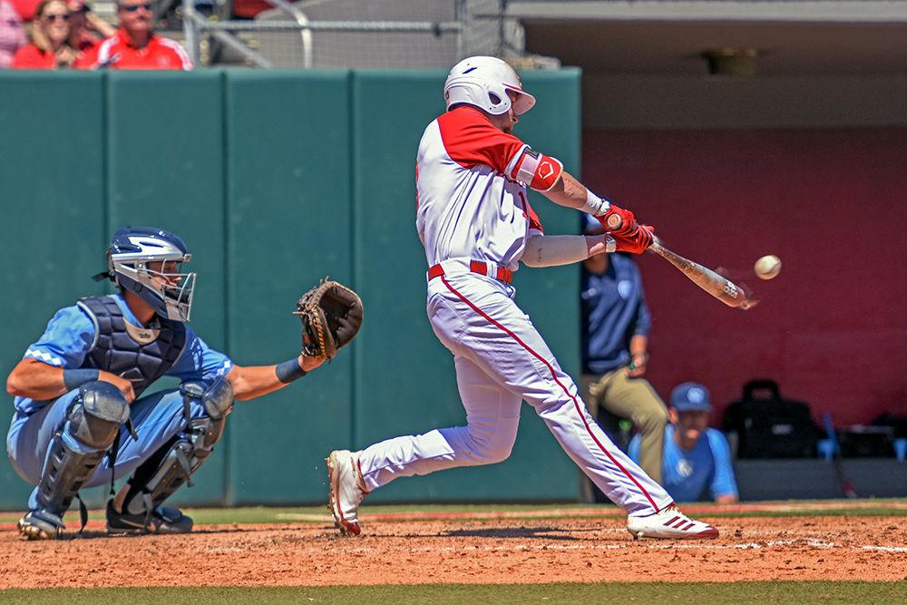 Senior outfielder Brock Deatherage hits a home run during the game versus UNC Chapel Hill on Sunday, April 29, 2018 in Doak Field at Dail Park. Deatherage had a career first after hitting two home runs versus the Heels. The Wolfpack lost to the Tar Heels 5-4.