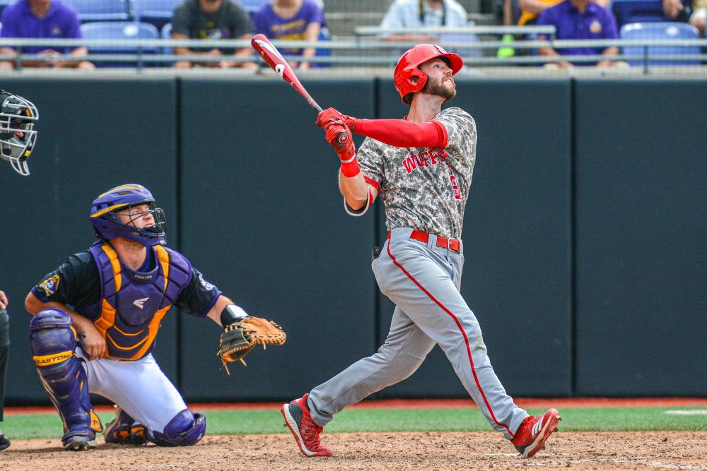 Senior infielder Evan Edwards watches his home run ball fly against ECU in his last at-bat for the Wolfpack on Sunday, June 2 at Clark-LeClair Stadium in Greenville. Edwards went 1-3 with one home run and one walk as the Wolfpack's season was ended by a score of 9-2.