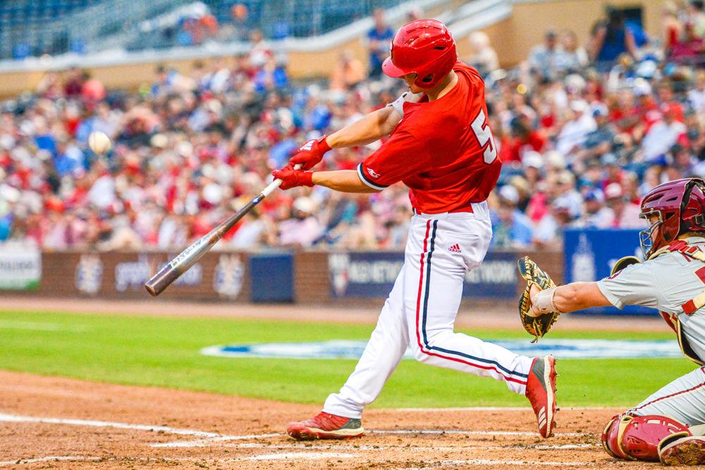 Sophomore catcher Patrick Bailey hits the ball against Florida State in the ACC Tournament on Friday, May 24, 2019 at Durham Bulls Athletic Park. Bailey went 0-2 with one walk and one strikeout as the Wolfpack lost 11-0.