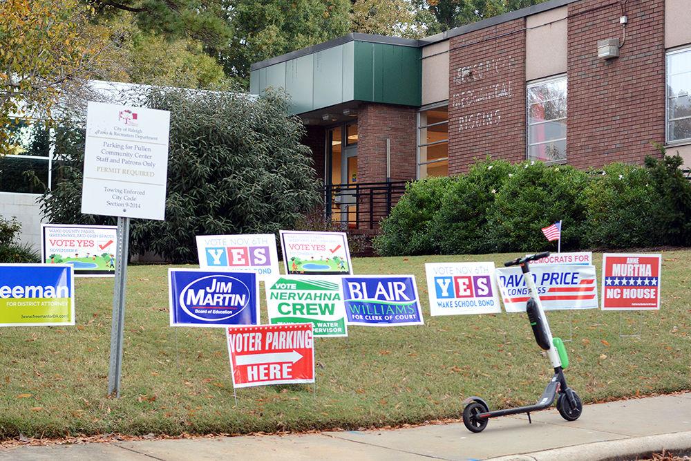 Campaign signs for midterm elections outside of the Pullen Park Community Center on Tuesday, Nov. 6.