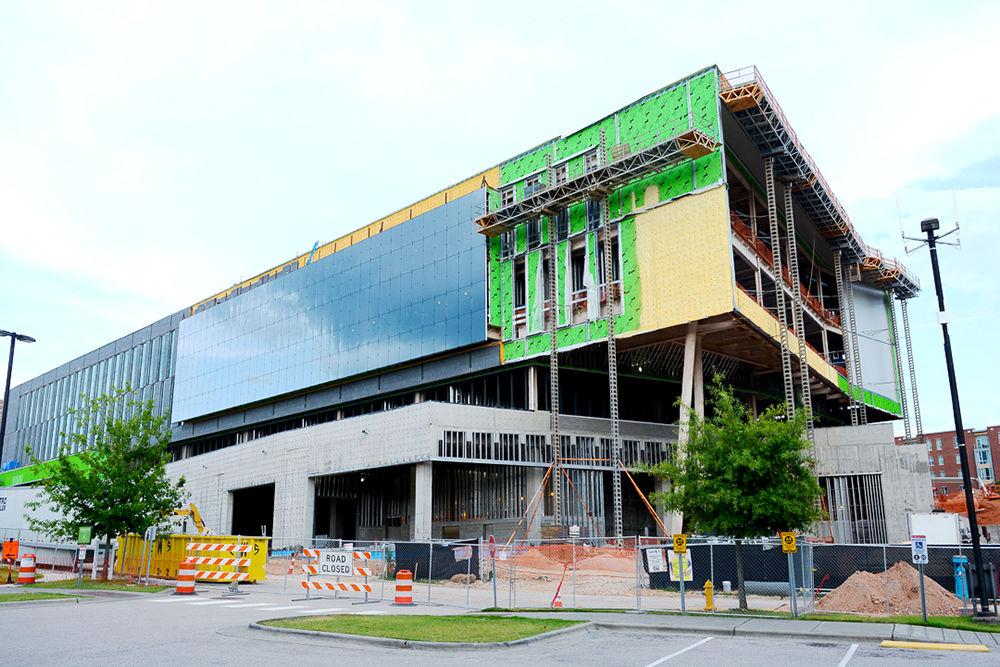 New engineering building Fitts-Woolard Hall construction continues on Centennial campus on Friday, July 19, 2019. The new building will be between EB 1 building and Hunt Library.