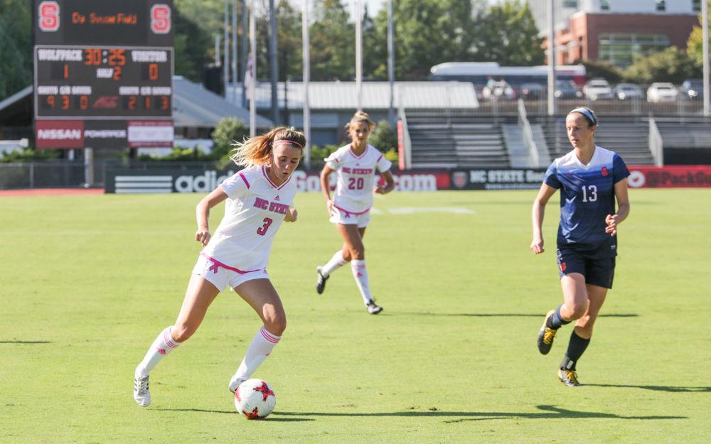 Sophomore defender Krissi Schuster swings toward the box after running down the side line during the 3-0 win over Syracuse on Saturday, Oct 14 in Dail Soccer Stadium.