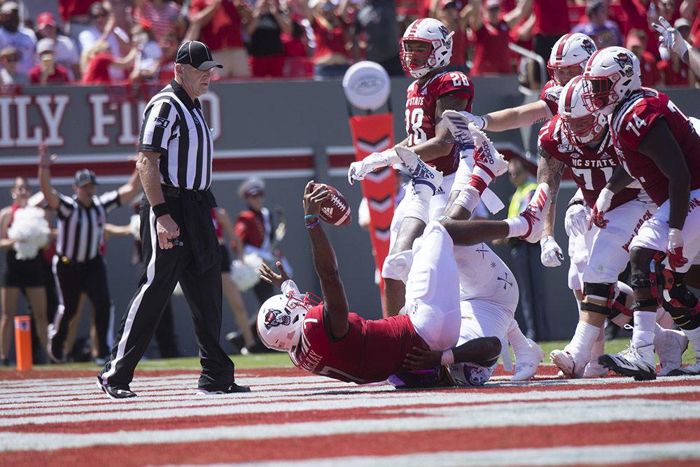 Redshirt sophomore Matthew McKay scores his first touchdown of the season, Saturday, Aug. 31, 2019 in Cartre-Finley Stadium. McKay rushed for a net gain of 35 yards, resulting in two touchdowns. The Wolfpack won the first game of the season against the East Carolina University Pirates, 34-6.