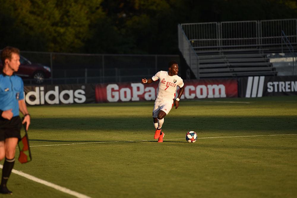 Sophomore forward Ivy Brisma carries the ball down the field during the game versus Loyola on Friday, August 30, 2019 in Dail Soccer Park. Brisma took two shots against the Greyhounds. NC State beat Loyola 2-1.