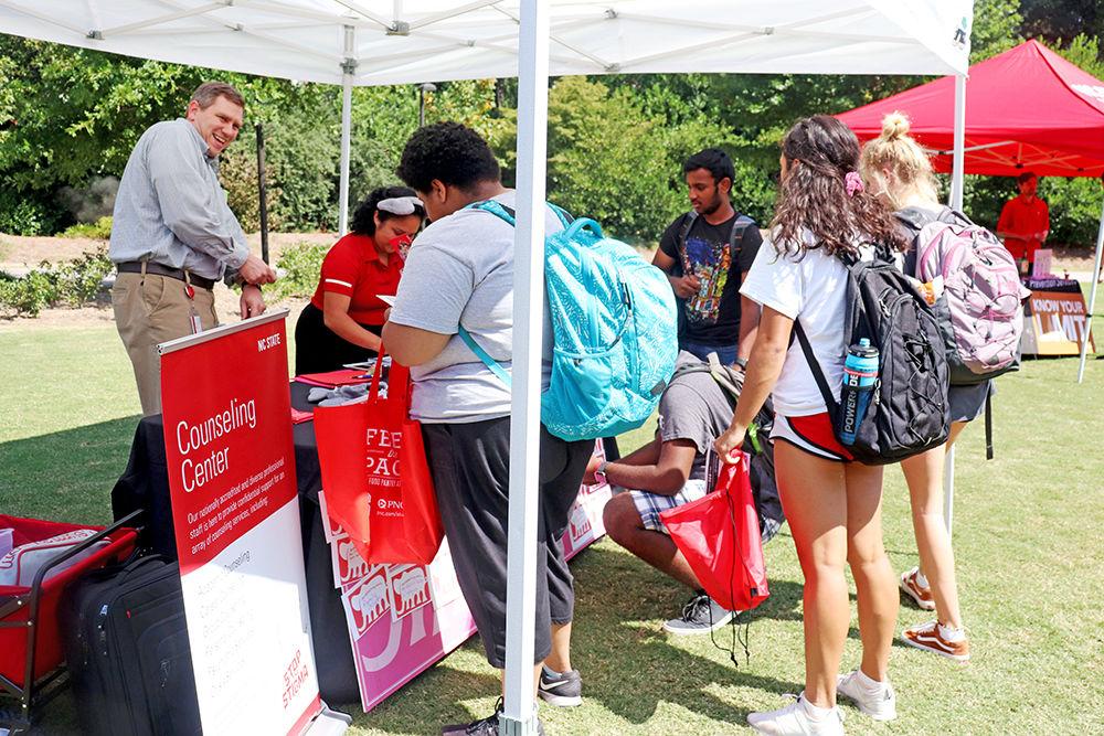 NC State students talk with the Counseling Center representatives and ask questions about how to get involved with the center on Sept. 25, 2019 during Fresh Check Day. Fresh Check Day was apart of the Healthy Campus Week event and focused on acknowledging current uprising problems with mental health and suicide prevention.