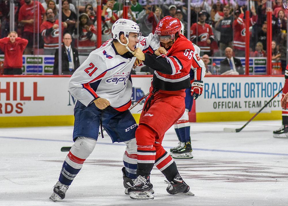 Carolina Hurricanes prospect Roland McKeown fights with Washington Capitals forward Garnet Hathaway during the second period of the game on Sunday, Sept. 29, 2019 in PNC Arena. Both players had a five minute penalty for fighting. The Canes lost to the Caps 4-3.
