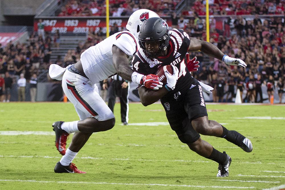 Freshman running back Zonovan Knight carries the ball during the Parents and Families Weekend football game against Ball State, Saturday, Sept. 21, 2019 in Carter-Finley Stadium. The Pack won against the Cardinals, 34-23.