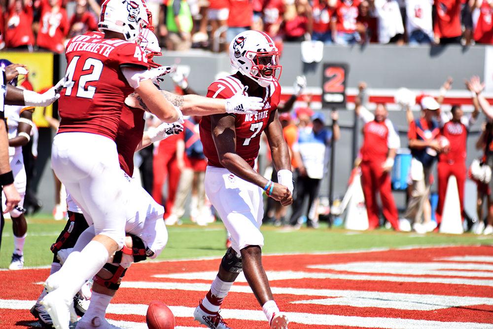 Redshirt sophomore quarterback Matthew McKay celebrates after scoring a touchdown against ECU on Saturday, Aug. 31, 2019 in Carter-Finley Stadium. McKay threw for 308 yards and rushed for 35 yards and had two touchdowns in the 34-6 win over the Pirates.