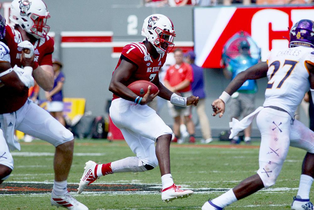 Redshirt sophomore quarterback Matthew McKay runs the ball against ECU on Saturday, Aug. 31, 2019 in Carter-Finley Stadium. McKay threw for 308 yards and rushed for 35 yards and had two touchdowns in the 34-6 win over the Pirates.