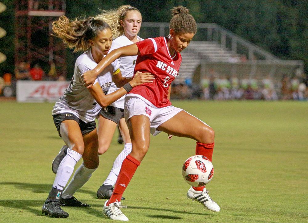 Junior forward Kia Rankin fights for possession on Thursday, Sept. 20 in Dail Soccer Field. Wake Forest put up 10 shots on goal, while NC State registered just 2. The Wolfpack lost 2-0.