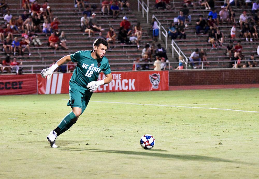 Redshirt senior goalkeeper Vincent Durand&#160;kicks the ball up the field during the game versus Loyola on Friday, Aug. 30, 2019 in Dail Soccer Field. Durand allowed one goal after multiple attacks during a corner kick. NC State beat Loyola 2-1.
