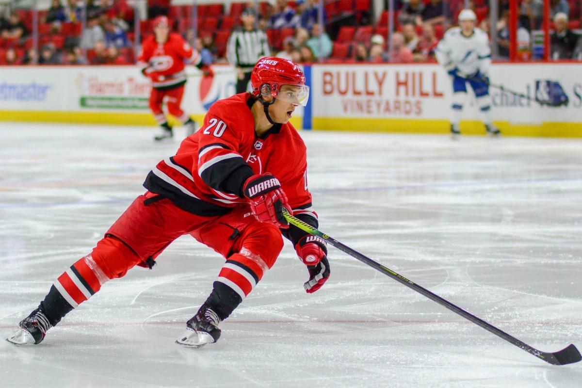 Carolina Hurricanes center Sebastian Aho glides down the ice during the pre-season game versus the Tampa Bay Lightning on Wednesday, Sept. 18, 2019 in PNC Arena.