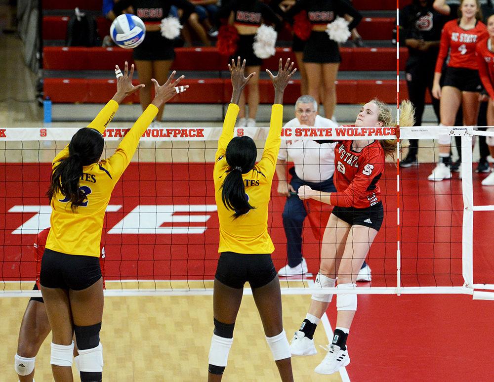 Freshman outside hitter Daniela McDonald smashes the ball against East Carolina University during their match on Tuesday, Sept. 10, 2019 at Reynolds Coliseum. The Wolfpack lost to the pirates 2-3.
