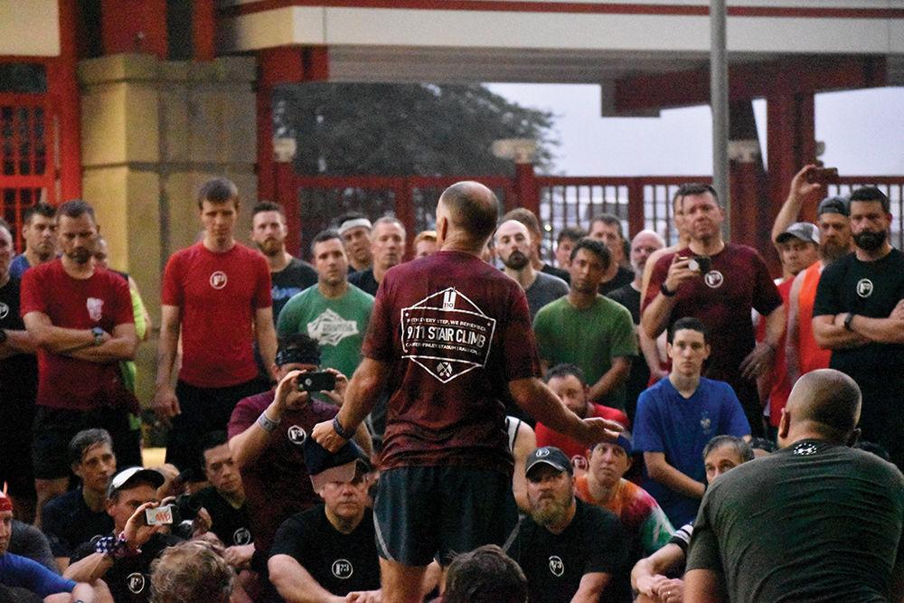 Brian Jodice speaks to F3 members after their annual 9/11 Stair Climb. In remembrance of 9/11, people from across Raleigh climbed 110 flights of stairs at Carter-Finley Stadium on Wednesday, Sept. 11, 2019.