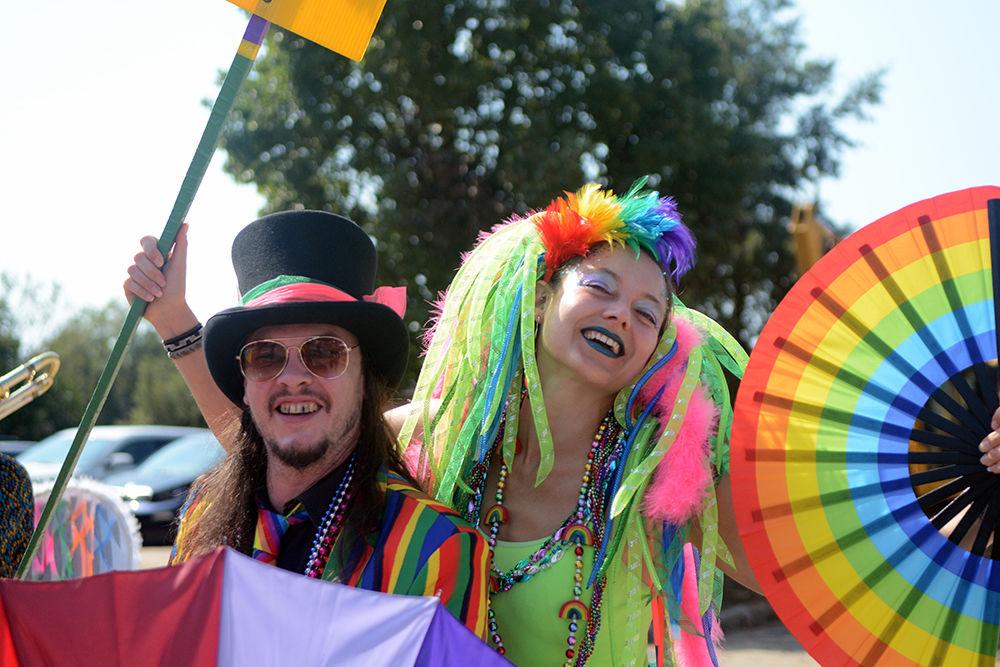 John Killian and Falyn Owens go all out at the Durham Pride Parade on Saturday, Sept. 28, 2019. They were part of a band float that played several songs on the parade route.