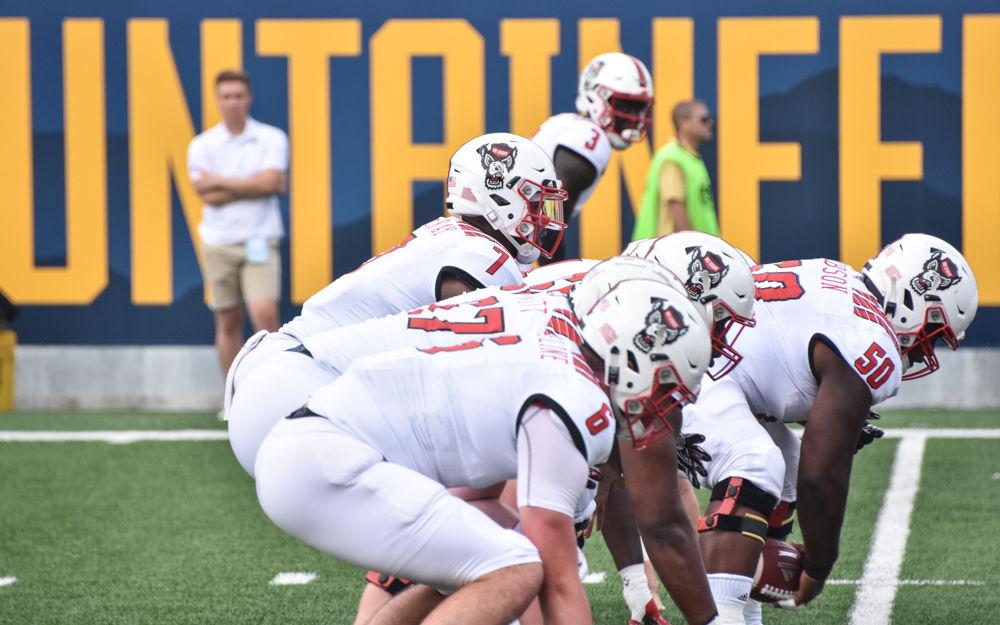 NC State's offensive line practices a play just before the team's game against West Virginia on September 14, 2019 at Milan Puskar Stadium. The Wolfpack lost, 44-27.