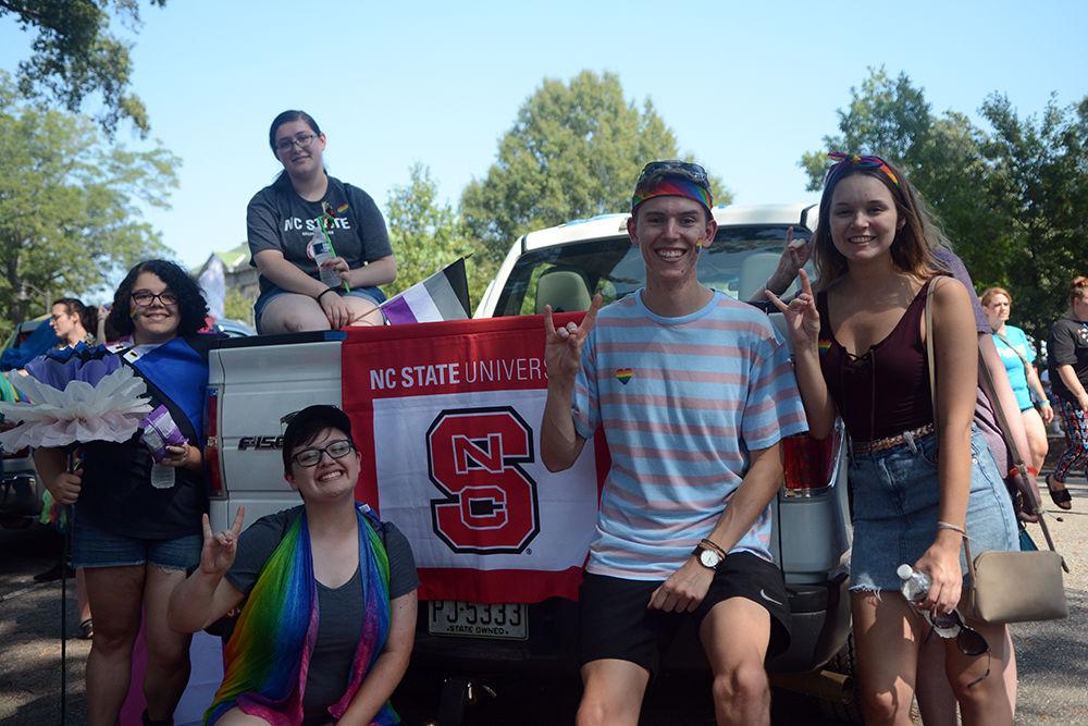 NC State students Madi Lang, Ryan Pecaut, Sam Wallace, and Paige Kanipe all show their pride at the Durham Pride Parade on Saturday, Sept. 28, 2019. State marched in the parade along with several other floats.