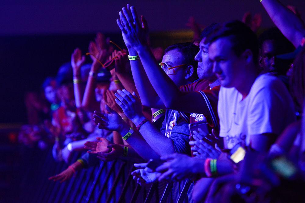 Fans line the floor excited for K CAMP to take the stage. The NC State Homecoming Concert is organized by UAB as a part of Red and White week at NC State. The concert took place at Reynolds Coliseum on Oct. 27, 2017.