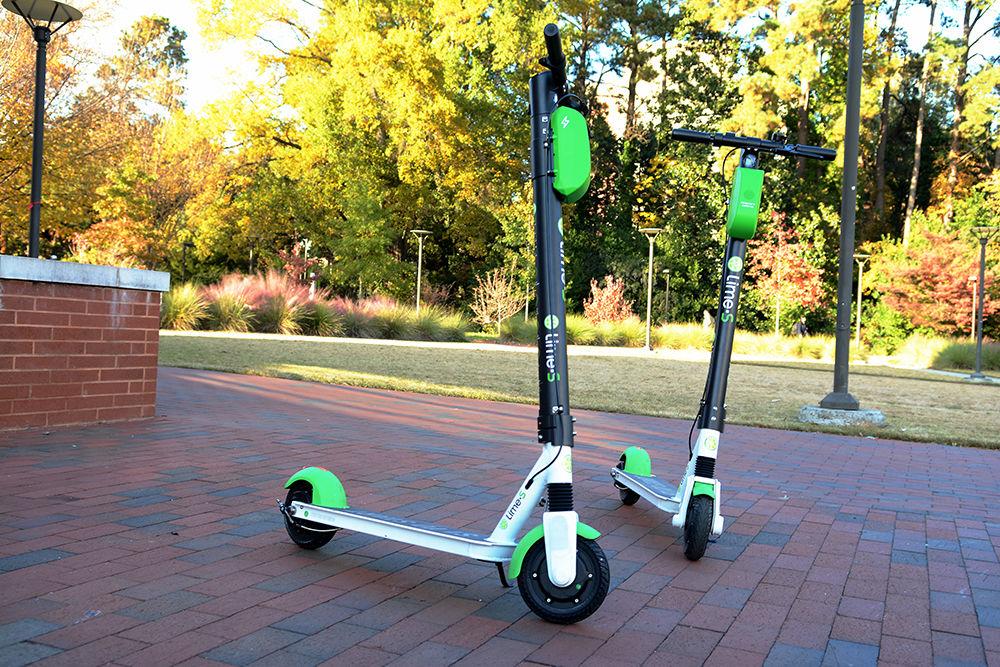 Lime-S electric scooters are seen outside Talley Student Union on November 20, 2018. Lime-S is a dockless electric scooter pilot program at NC State.