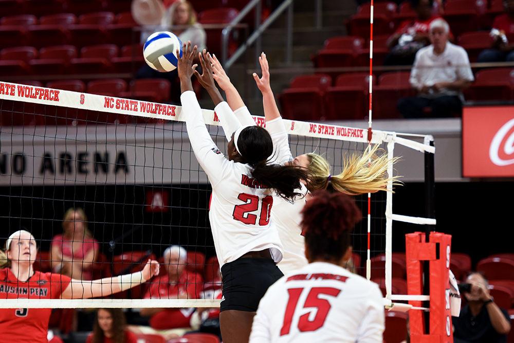 Senior middle blocker Lauryn Terry goes for the block against Austin Peay University in their match on Friday, Aug. 30, 2019 at Reynolds Coliseum. The Wolfpack would go on to beat the the Governers 3-0.