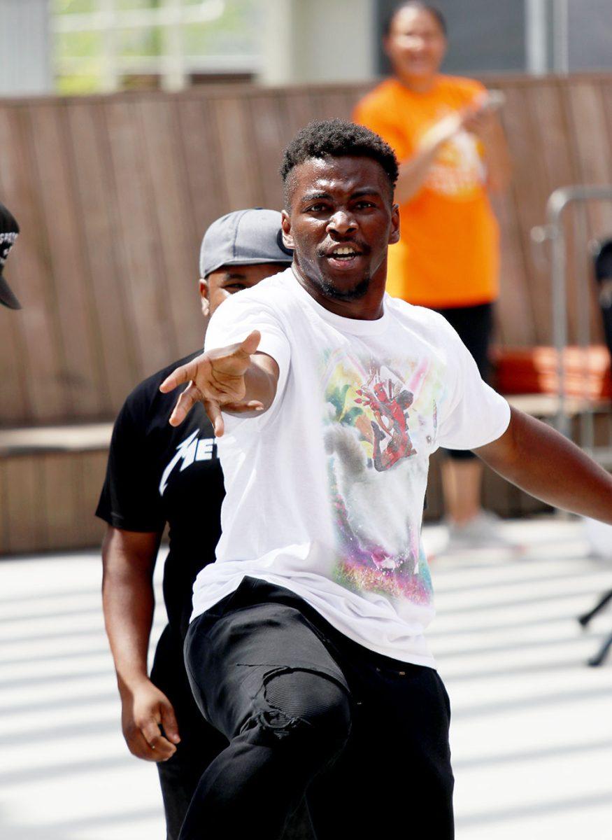 Travis Simmons, part of the dance group HypeFiendz23, performed at the 14th annual SPARKcon on Saturday Sept. 14, 2019 in the Warehouse District of Raleigh. Part of a showcase event by dancesSPARK, he danced with over 40 dancers and dance groups.