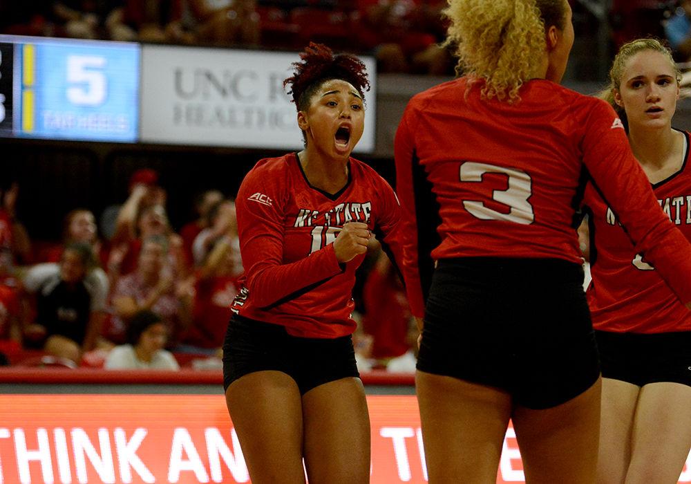 Sophomore Jade Parchment celebrates a successful point against UNC on Wednesday, Oct. 2, 2019 in Reynolds Coliseum. Parchment played in 5 sets, had 14 kills, 1 assist, and 10 digs with a total 14.5 points in the 2-3 loss against UNC.
