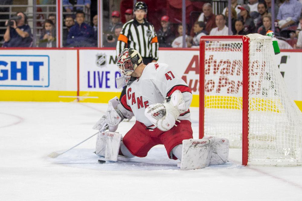 Goaltender James Reimer blocks a shot versus the Blue Jackets on Saturday, Oct. 12, 2019 at PNC Arena. Reimer let three goals in for 35 shots. The Hurricanes lost 3-2.
