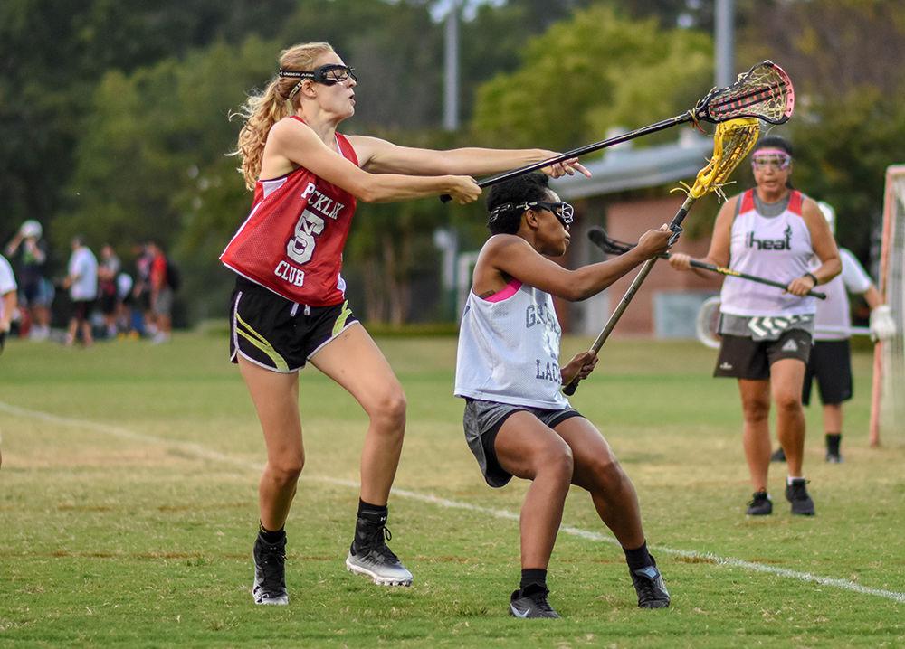 The NC State Women's Club Lacrosse team practices on Monday, Sept. 30, 2019 at the Method Road Fields on NC State's campus. The women's club team plays in the Mid-Atlantic Women's Lacrosse League (MAWLL) and the Women's Collegiate Lacrosse Association (WCLA) and is a student-led club team.