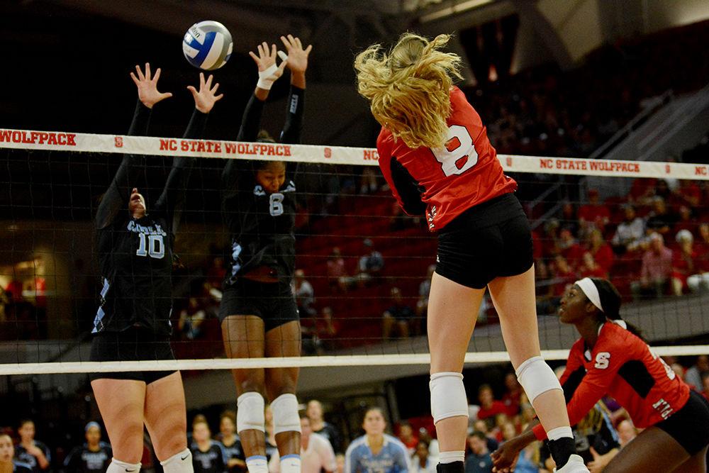 Freshman Daniela McDonald knocks the ball over the net against UNC on Wednesday, Oct. 2, 2019 in Reynolds Coliseum. McDonald played in 5 sets, had 1 kill, and 7 digs with a total of 6 points in the 2-3 loss against UNC.