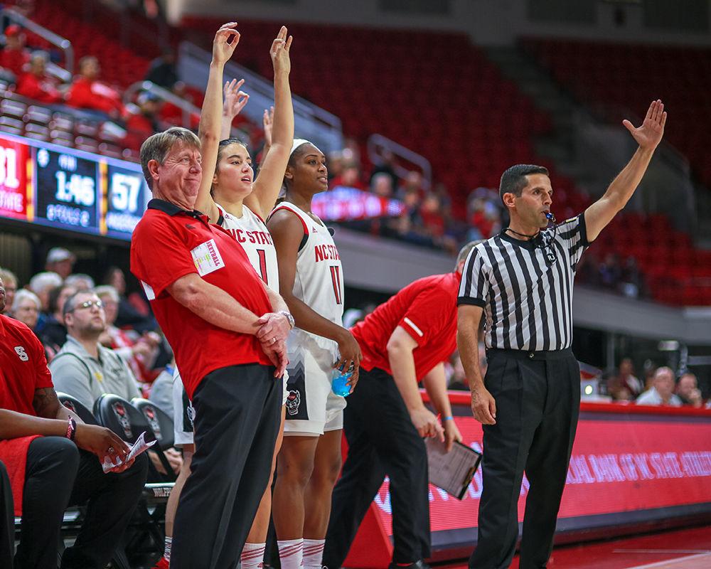 Head coach Wes Moore leans back as a three goes just wide during the 83-57 win in exhibition over Anderson University on Thursday, Nov. 1 in Reynolds Coliseum.