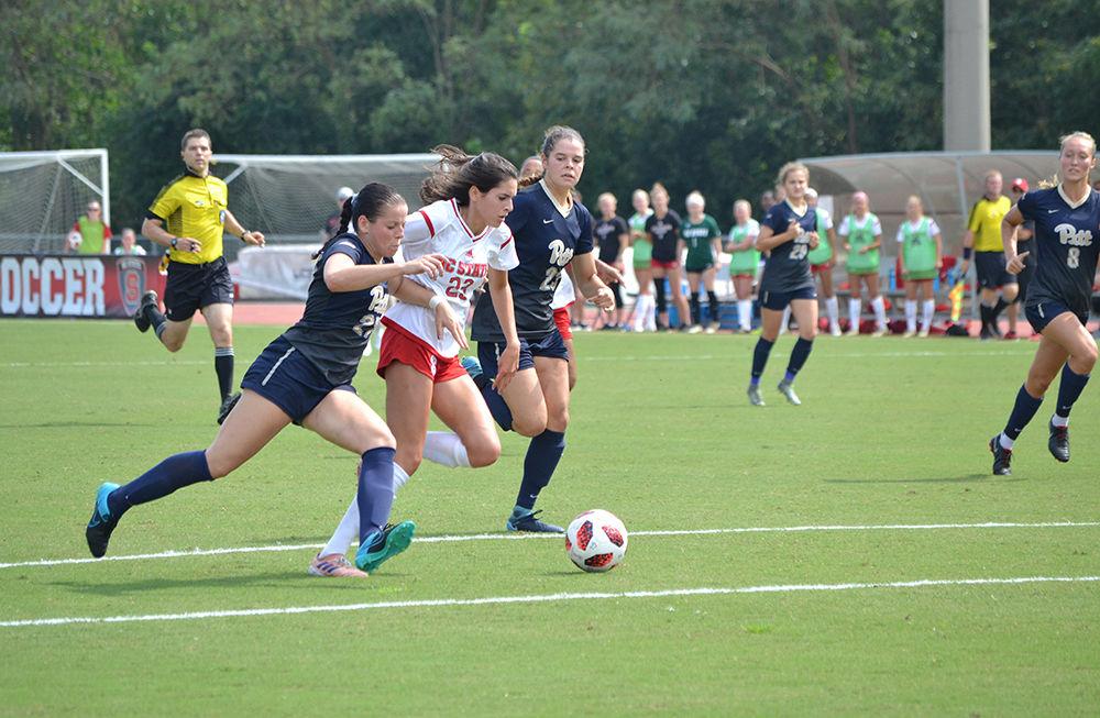 Freshman midfielder Anna Toohey runs with the ball during a soccer match against Pittsburgh on Sunday, Sept. 23, 2018 at Dail Soccer Stadium on Sunday, Sept. 23, 2018. The NC State Wolfpack beat the Pittsburgh Panthers 6-0 for their eighth win of the season.