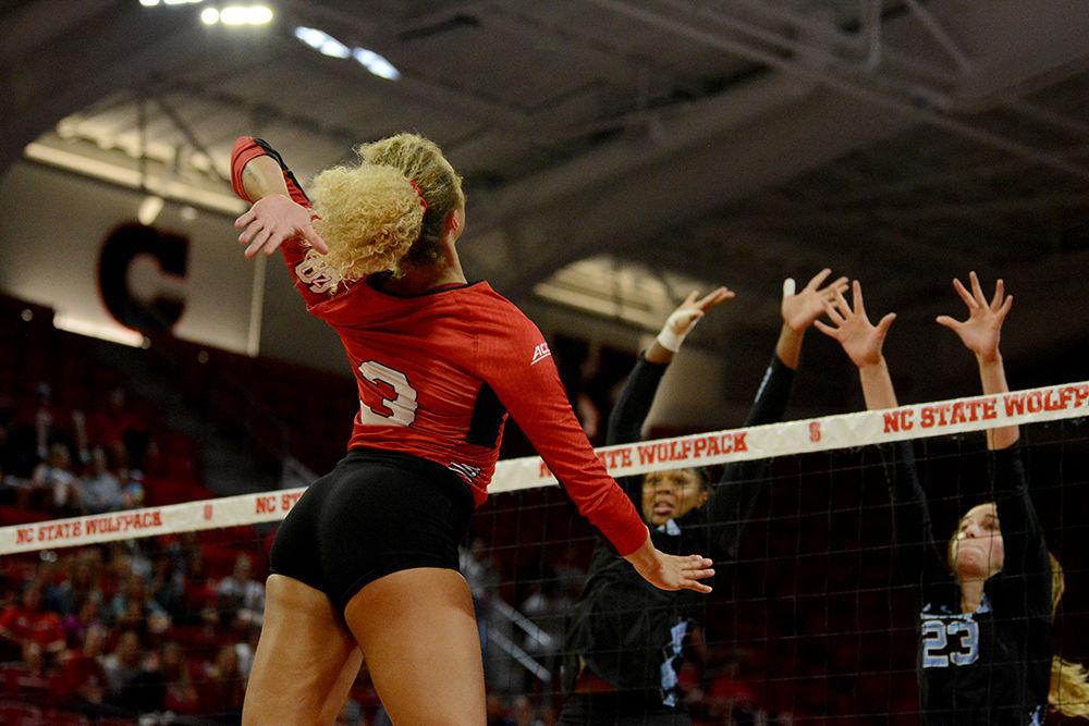 Junior Melissa Evans prepares to spike the ball against UNC on Wednesday, Oct. 2, 2019 in Reynolds Coliseum. Evans played in 5 sets, had 15 kills, and 5 digs with a total 16.5 points in the 2-3 loss against UNC.