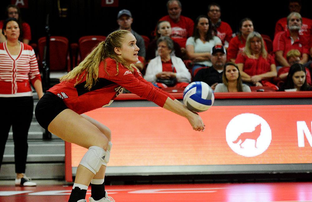 Freshman outside hitter, Daniela McDonald digs the ball against UNC on Oct. 2, 2019 in Reynolds Coliseum. McDonald played in 5 sets and had six kills and seven digs in the 2-3 loss to UNC.