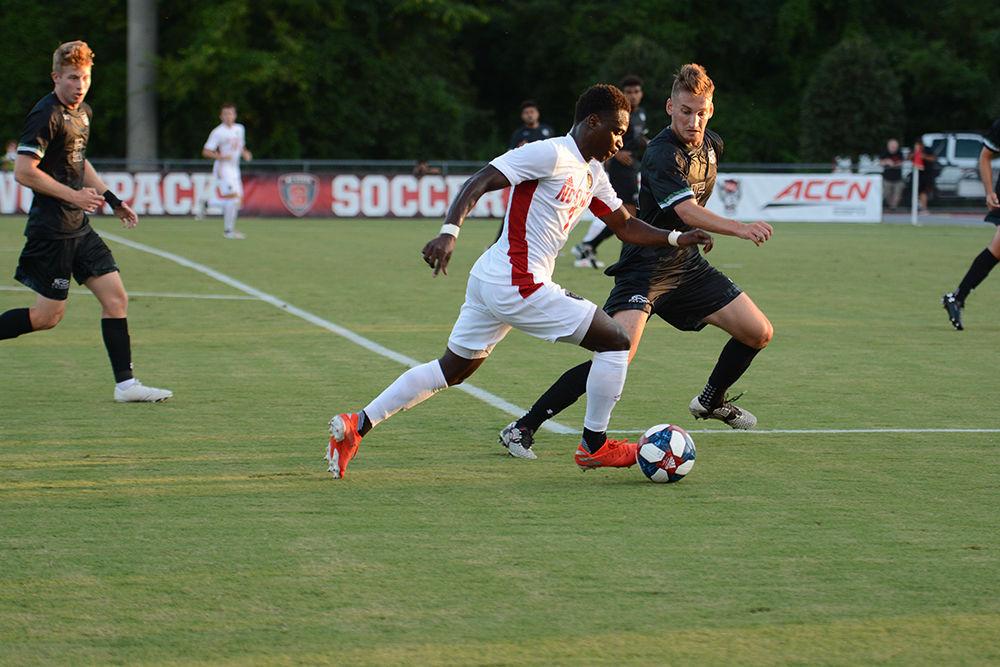 Sophomore forward Ivy Brisma dribbles the ball towards the goal during the game versus Loyola on Friday, August 30, 2019 in Dail Soccer Park. Brisma had two shots during the game against the Greyhounds. The Wolfpack beat Loyola 2-1.
