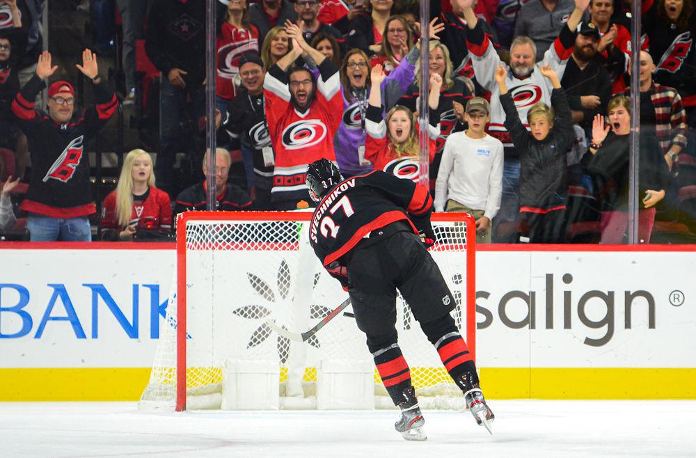 Hurricanes right wing Andrei Svechnikov scores an empty net goal against the New York Islanders on Friday, Oct. 11 at PNC Arena. Svechnikov totaled one goal and one assist as the Hurricanes won 5-2.