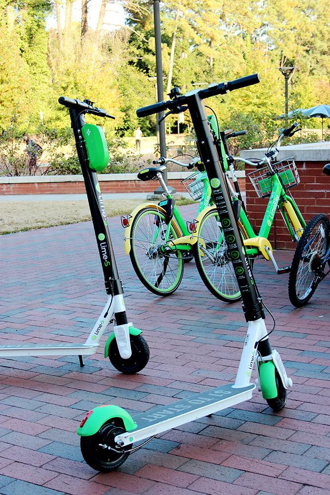 Lime-S electric scooters are parked outside Talley Student Union on Tuesday, November 20, 2018. The company allows users to rent the electric scooters at a small fee.