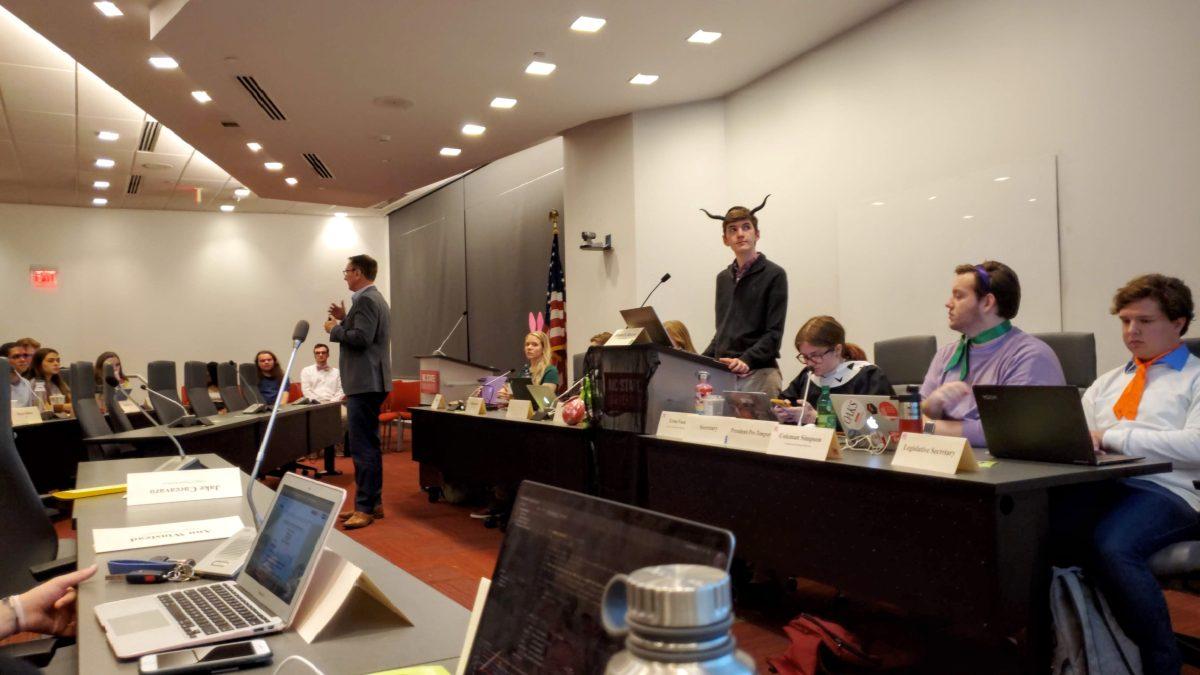 Eric Hawkes, director of Wellness and Recreation, speaks at the Oct. 30 Senate meeting about construction at the Carmichael Gymnasium complex. Senators came in Halloween costume to the meeting.