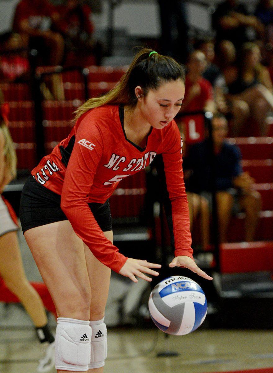 Freshman setter Kristen McDaniel prepares to serve against UNC on Oct. 2, 2019 in Reynolds Coliseum. McDaniel played in four sets in the 2-3 loss to UNC.